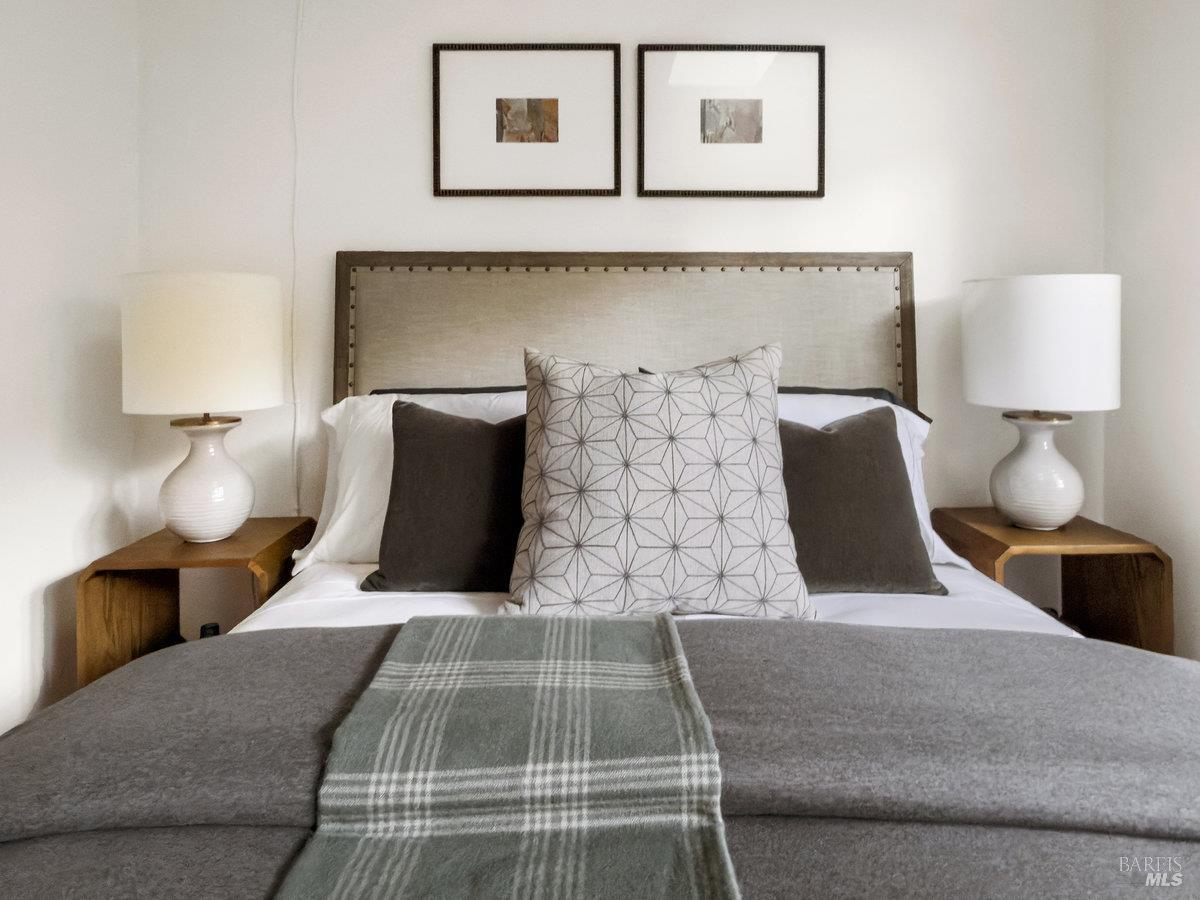 300 Hazel Avenue Mill Valley, CA 94941 - Photo 17 of 50 a bedroom with a bed and lamp