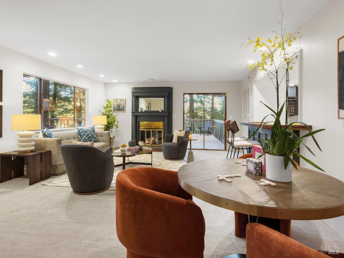 300 Hazel Avenue Mill Valley, CA 94941 - Photo 21 of 50 a living room with furniture a chandelier and a dining room