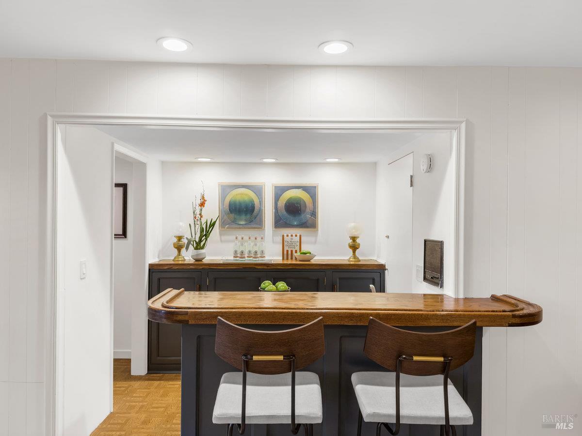300 Hazel Avenue Mill Valley, CA 94941 - Photo 25 of 50 a bathroom with a sink a mirror and a vanity