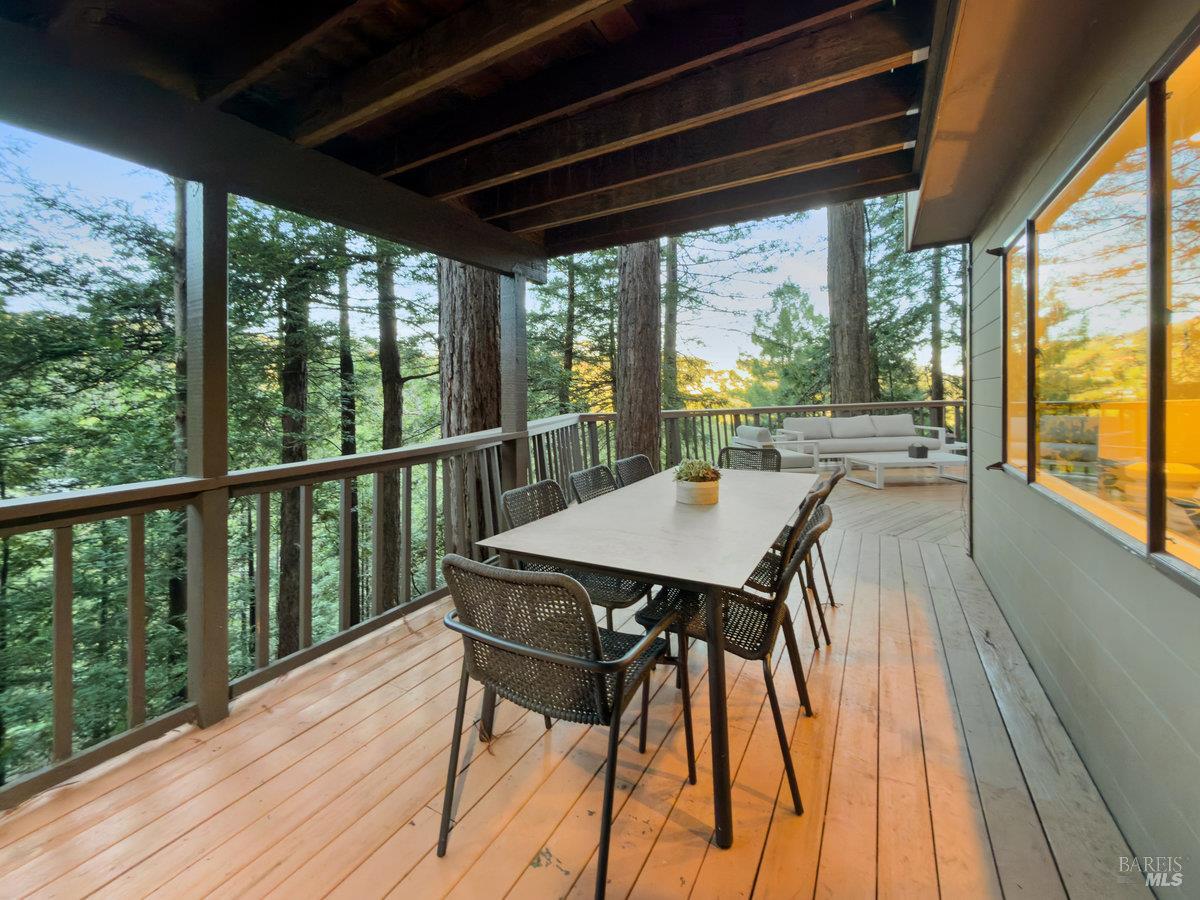 300 Hazel Avenue Mill Valley, CA 94941 - Photo 39 of 50 a view of a patio with a table chairs and wooden floor