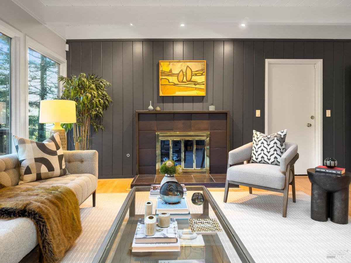 300 Hazel Avenue Mill Valley, CA 94941 - Photo 4 of 50 a living room with furniture and a fireplace