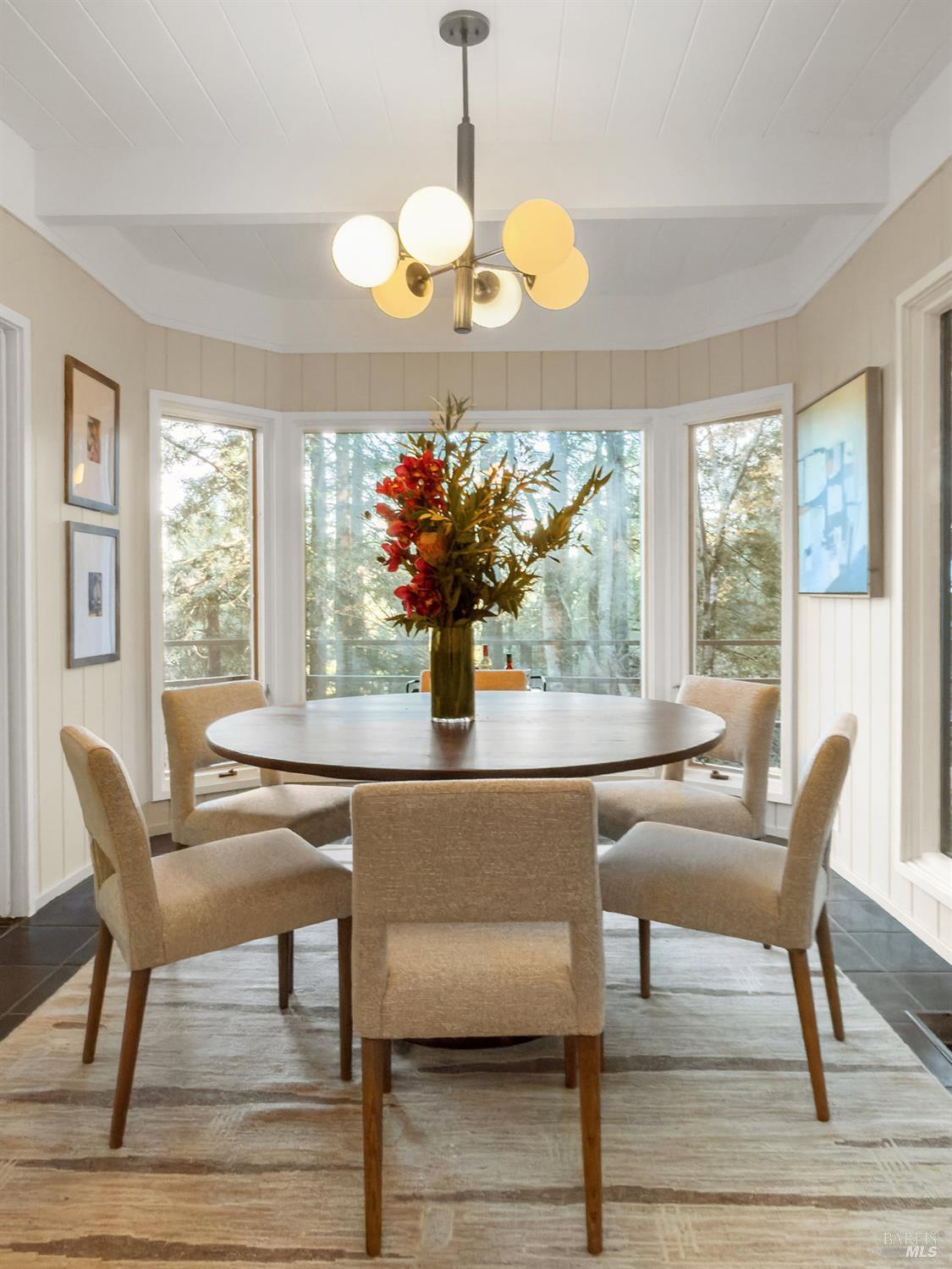300 Hazel Avenue Mill Valley, CA 94941 - Photo 8 of 50 a dining room table chair and chandelier