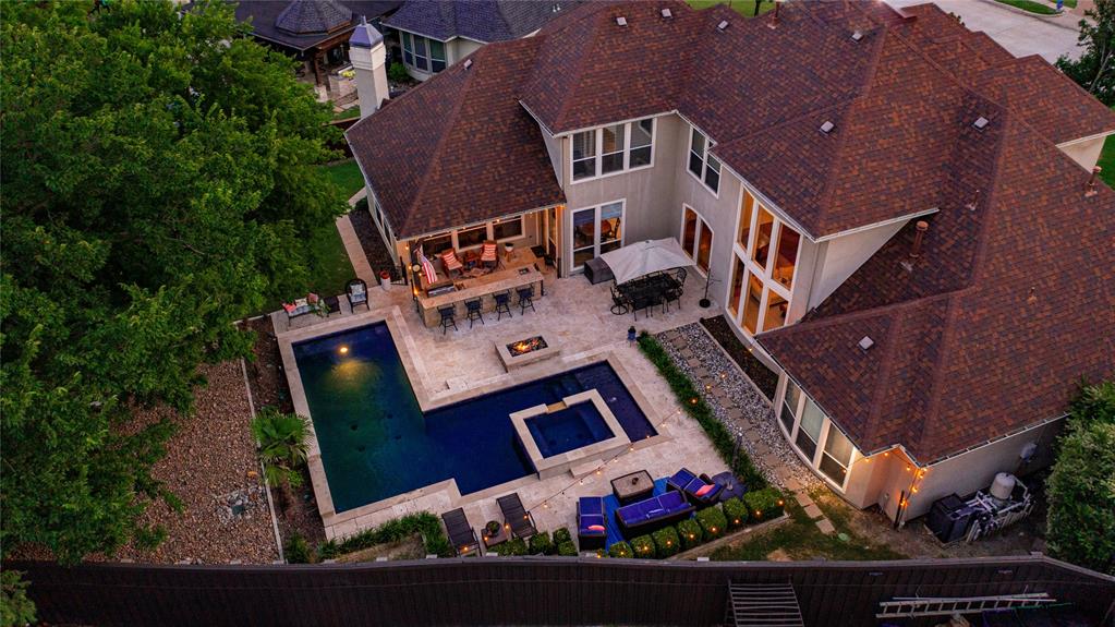 719 Starlight Pass Heath, TX 75032 - Photo 1 of 1 an aerial view of a house with a yard