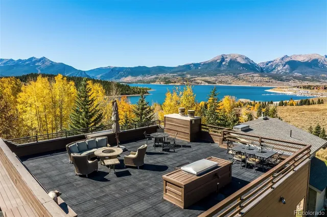 a view of a chairs and table in patio
