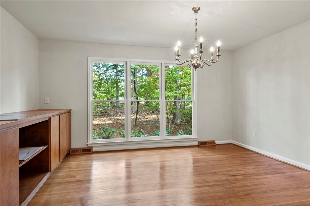 225 Arrowhead Trail Easley, SC 29642 - Photo 26 of 33 This bright interior space features natural light and polished hardwood flooring.