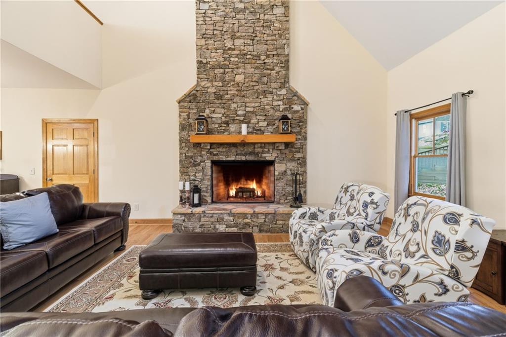 11 Poplar Circle Big Canoe, GA 30143 - Photo 4 of 34 a living room with furniture and a fireplace