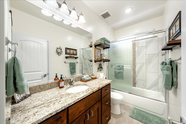 357 East Main Street Enterprise, UT 84725 - Photo 38 of 71 Bathroom featuring vanity and combined bath / shower with glass door