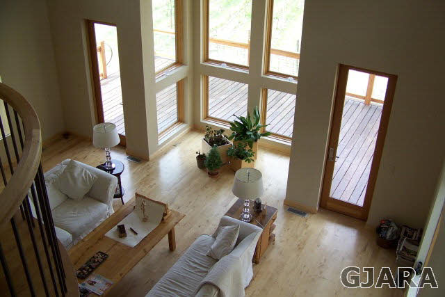 680 39 Road Palisade, CO 81526 - Photo 12 of 32 a living room with furniture and floor to ceiling windows