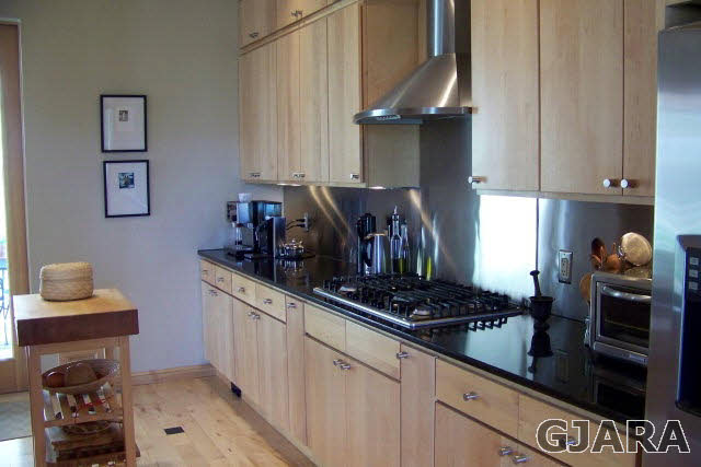 680 39 Road Palisade, CO 81526 - Photo 14 of 32 a kitchen with stainless steel appliances granite countertop a stove and a sink
