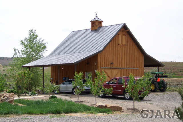680 39 Road Palisade, CO 81526 - Photo 6 of 32 a front view of a house with garden