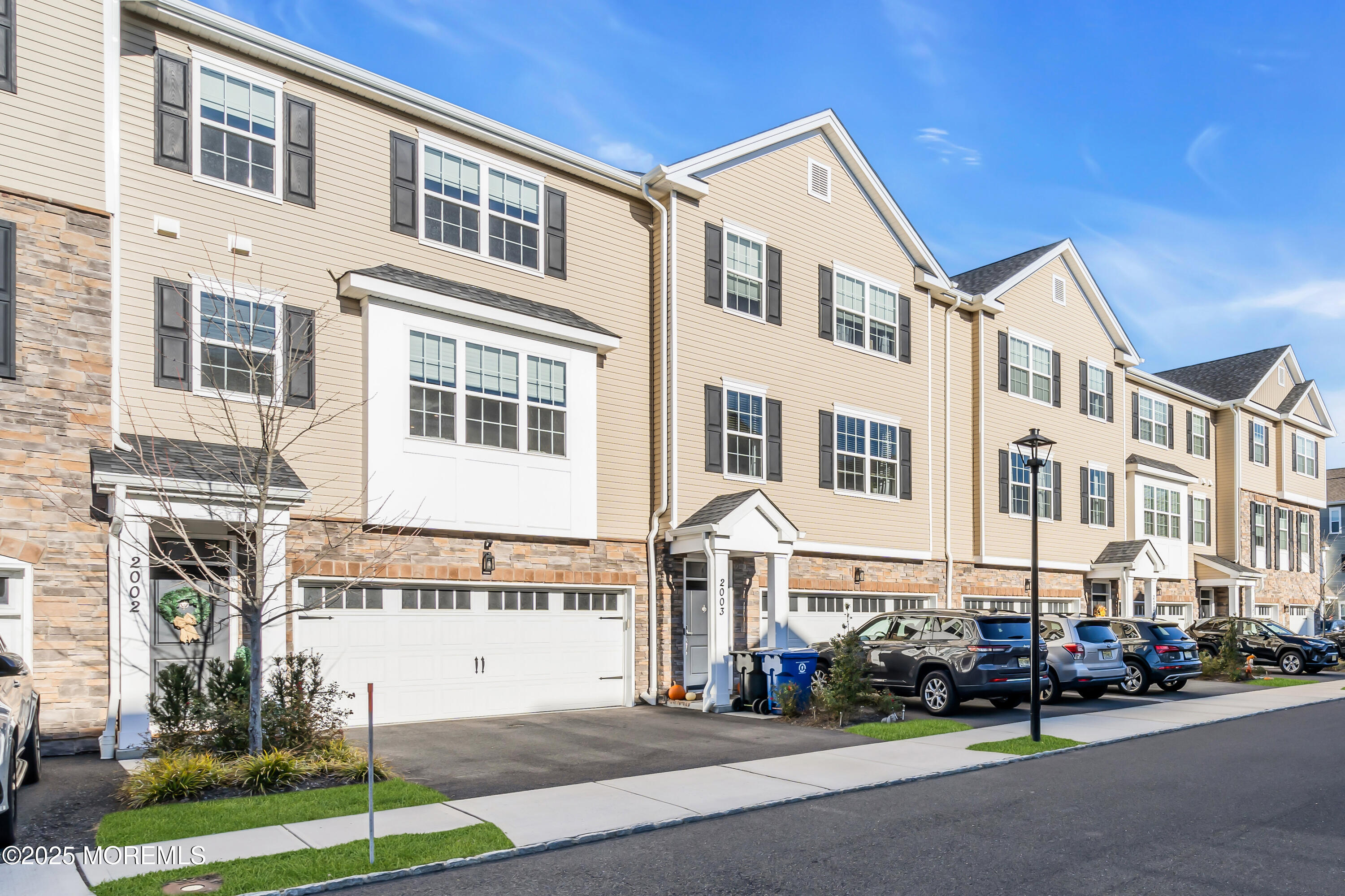 a front view of a building with street view
