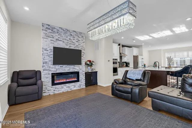 a bathroom with a sink toilet and a mirror