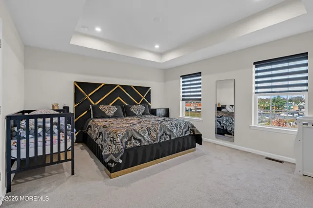 a view of walk in closet with clothes