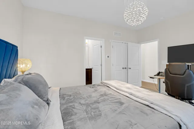 a view of a house with backyard and porch