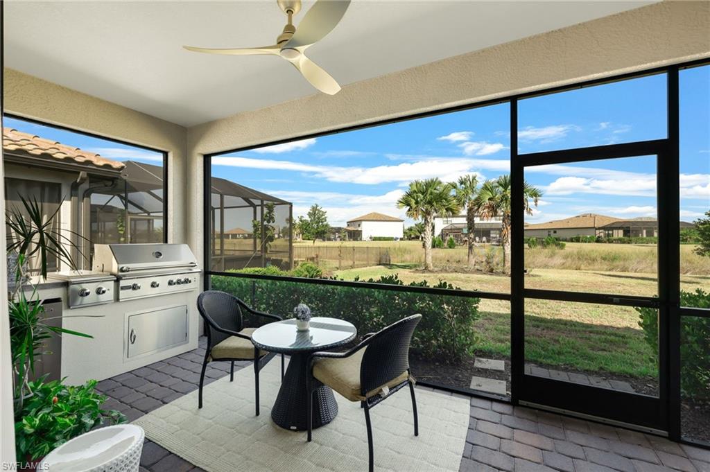 19724 The Pl Boulevard Estero, FL 33928 - Photo 34 of 36 a view of a living room and floor to ceiling window or wooden floor