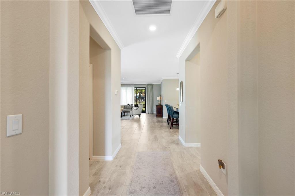 19724 The Pl Boulevard Estero, FL 33928 - Photo 10 of 36 a view of a hallway view with living room