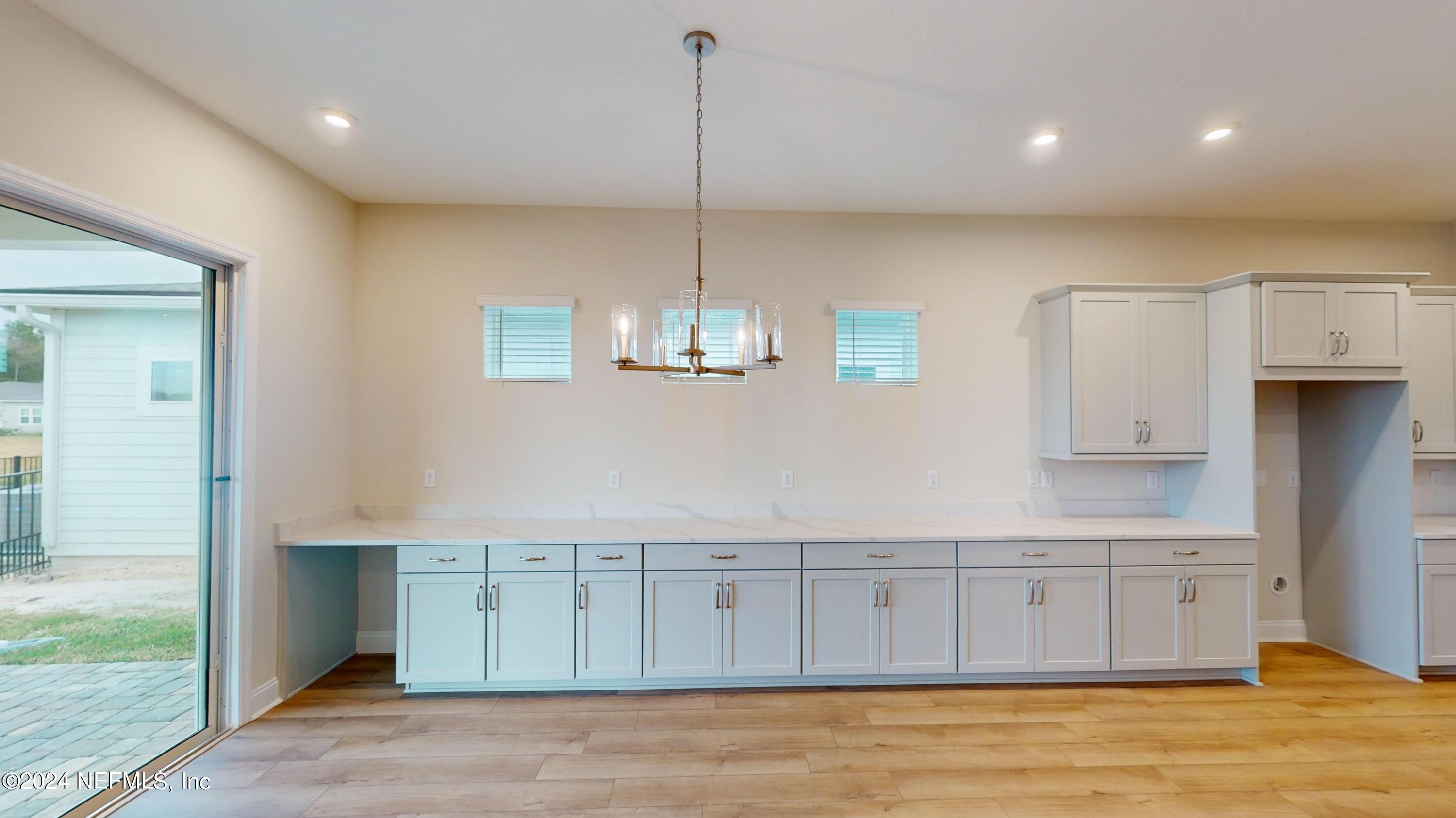 283 Pinellas Way St. Johns, FL 32259 - Photo 14 of 71 a view of a kitchen with a sink and dishwasher cabinets