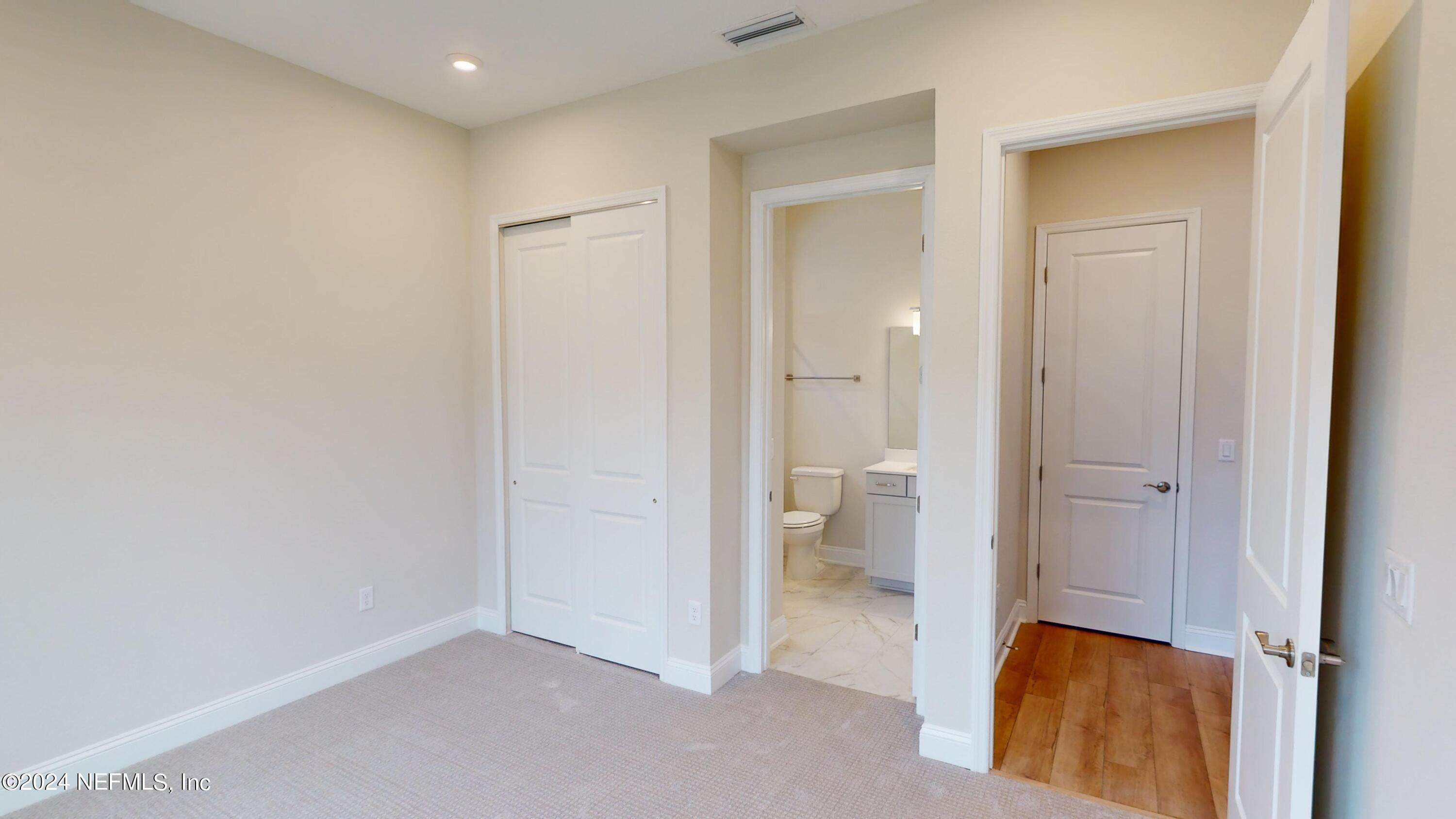 283 Pinellas Way St. Johns, FL 32259 - Photo 2 of 71 a view of a bathroom with a toilet and a sink