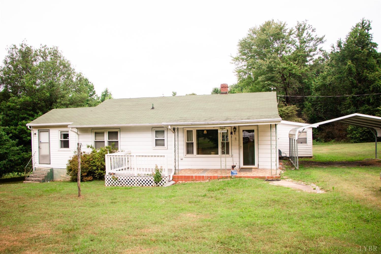 296 Pamplin Road Pamplin, VA 23958 - Photo 1 of 23 a view of a house with a backyard