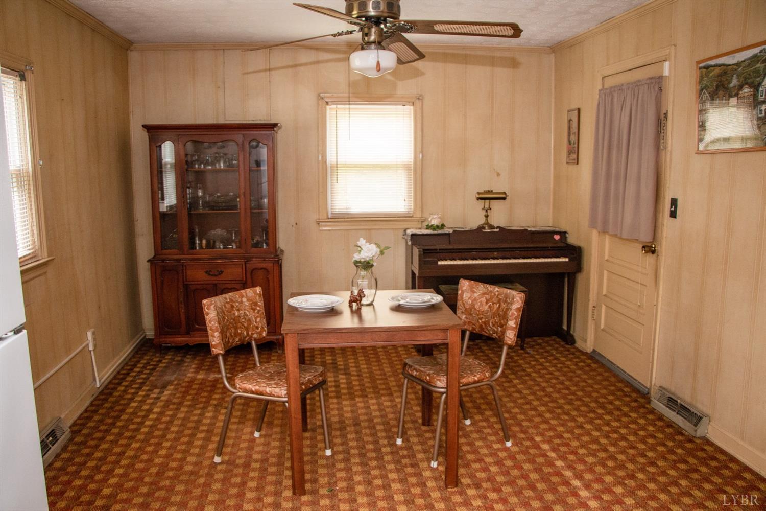296 Pamplin Road Pamplin, VA 23958 - Photo 11 of 23 a living room with furniture a window and a chandelier