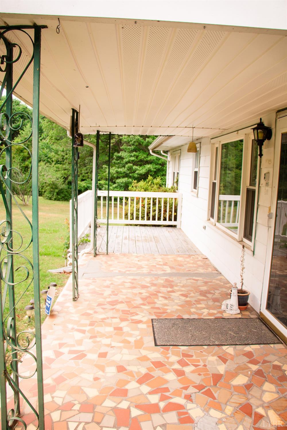 296 Pamplin Road Pamplin, VA 23958 - Photo 3 of 23 a view of a porch with a floor to ceiling window