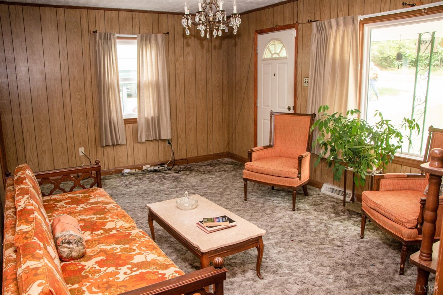 296 Pamplin Road Pamplin, VA 23958 - Photo 6 of 23 a living room with furniture and a potted plant