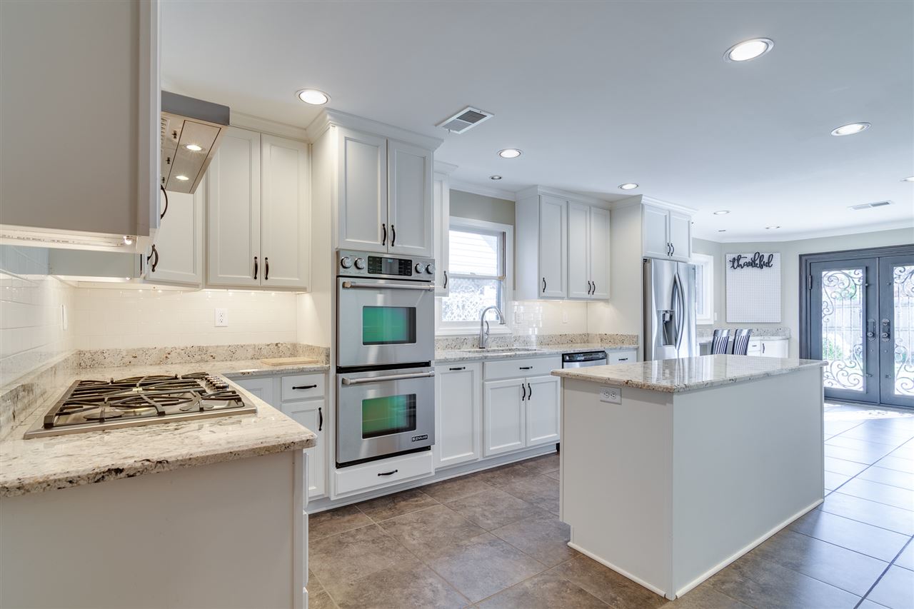 420 Meadvale Road Memphis, TN 38120 - Photo 1 of 25 Check out the fabulous kitchen! Monogram 5-burner gas cooktop with vent hood and pot filler. Tons of cabinetry in crisp white. Walk-in pantry, island, and under counter microwave!