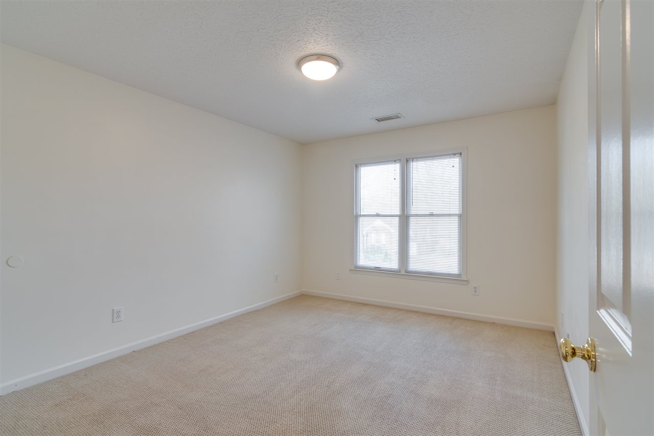 420 Meadvale Road Memphis, TN 38120 - Photo 16 of 25 Upstairs features 3 bedrooms AND a Bonus Room. Each Bedroom features a large, walk-in closet.
