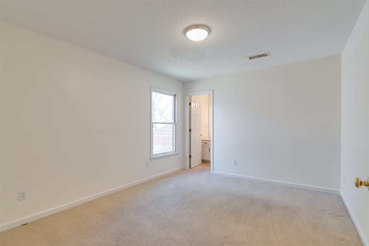 420 Meadvale Road Memphis, TN 38120 - Photo 17 of 25 Bedrooms 3 and 4 share a jack-and-jill bath which also contains a hall door for Bedroom 2 access and guest access.