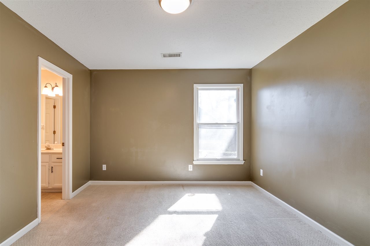 420 Meadvale Road Memphis, TN 38120 - Photo 20 of 25 Note the entry to jack-and-jill bath on the left.