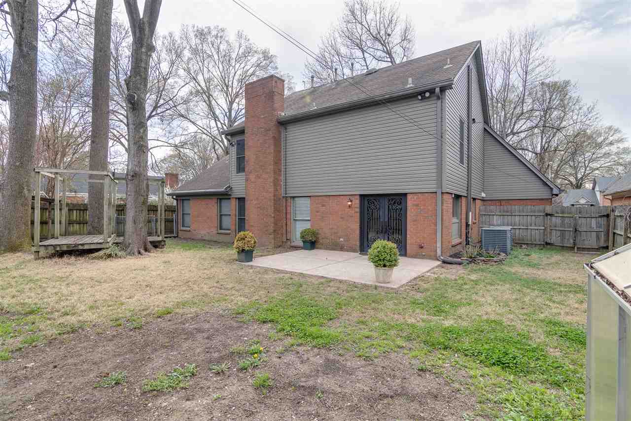 420 Meadvale Road Memphis, TN 38120 - Photo 24 of 25 Backyard features plenty of space to entertain, whether it's friends, family, or pets! Note the new patio which contains a dedicated gas line for the grill.