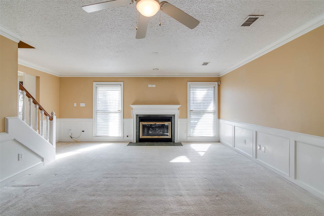 420 Meadvale Road Memphis, TN 38120 - Photo 9 of 25 Spacious Den with gas fireplace. Plenty of room to entertain friends or enjoy family.