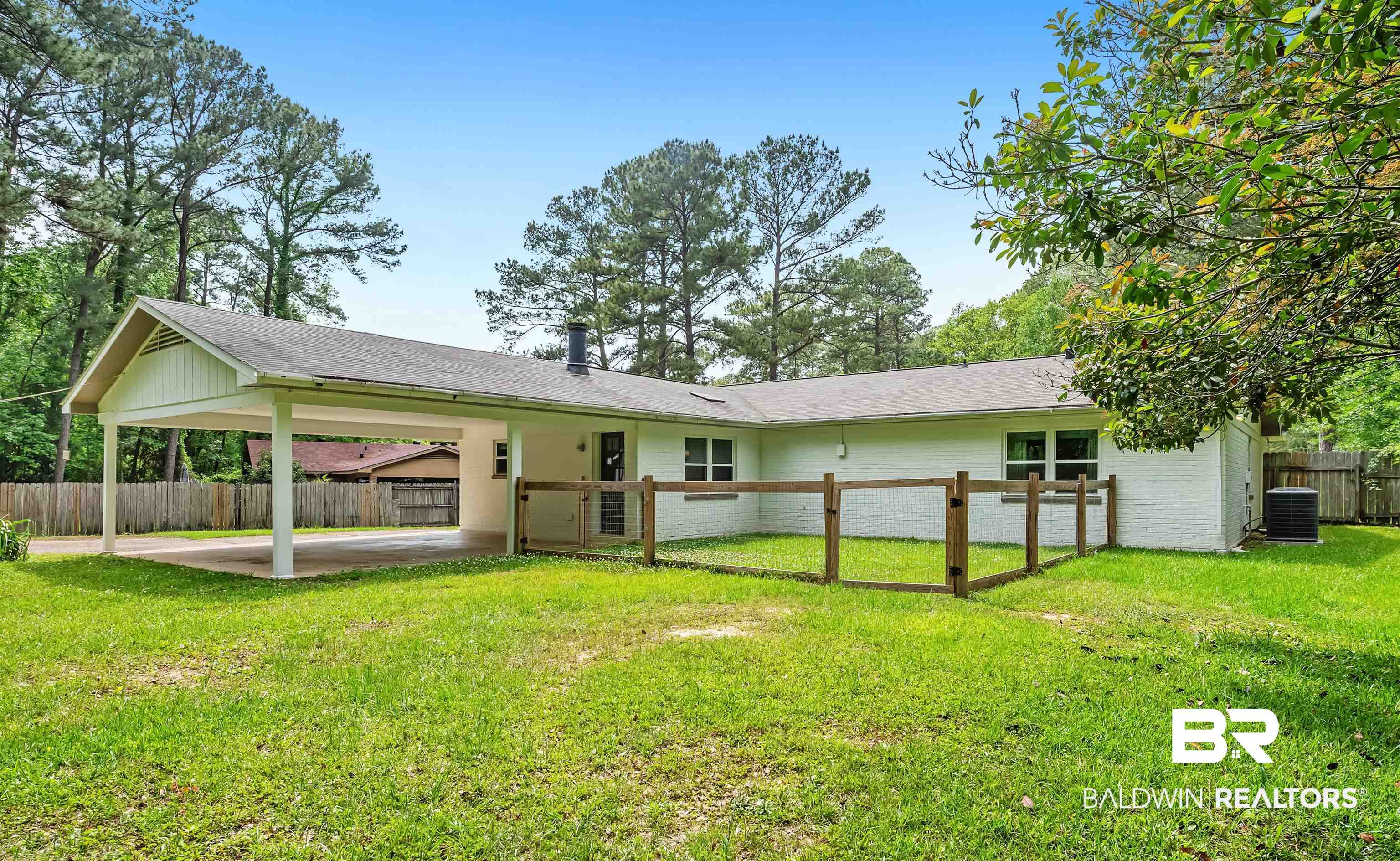 28 Caisson Trace Spanish Fort, AL 36527 - Photo 42 of 51 Back of house with fence, a yard, central AC unit, and brick siding
