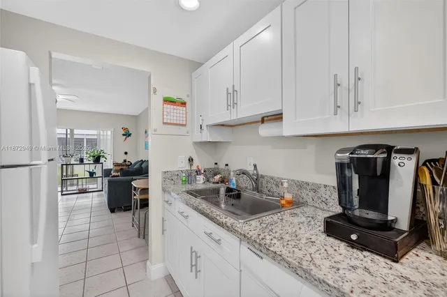 $129,000 | 2261 Northeast 67th Street, Unit 1806, Fort Lauderdale, FL 33308