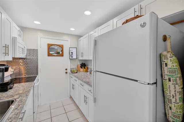 $129,000 | 2261 Northeast 67th Street, Unit 1806, Fort Lauderdale, FL 33308