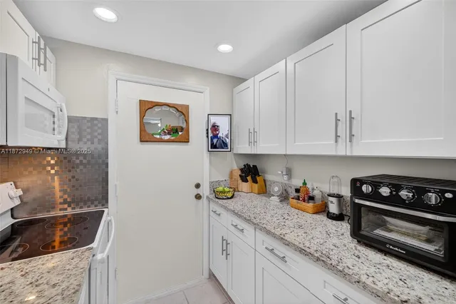 $129,000 | 2261 Northeast 67th Street, Unit 1806, Fort Lauderdale, FL 33308