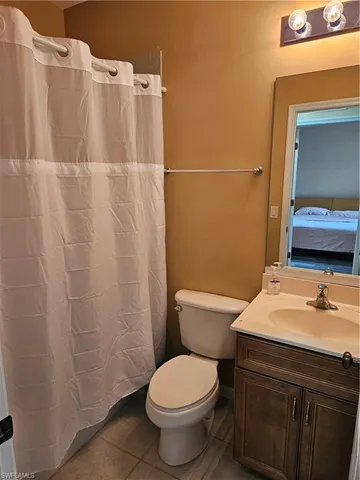 a view of hallway with wooden floor