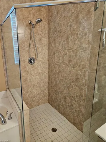 a living room with a couch and a rug