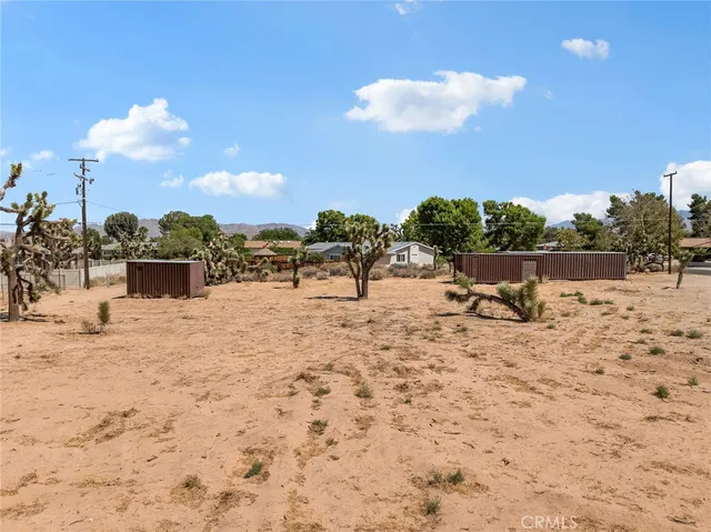 a view of a lake with a yard