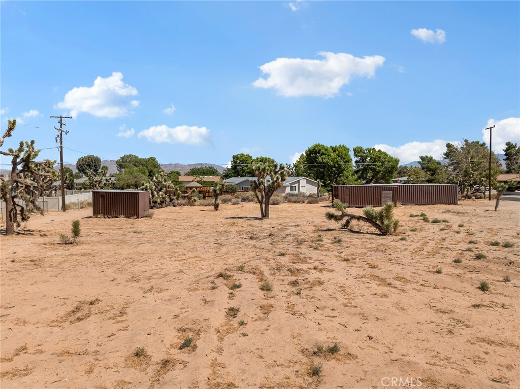 0 Modoc Road Apple Valley, CA 92308 - Photo 3 of 10 a view of a lake with a yard