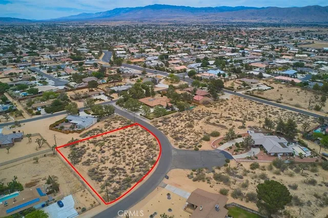 an aerial view of a residential apartment building in a city