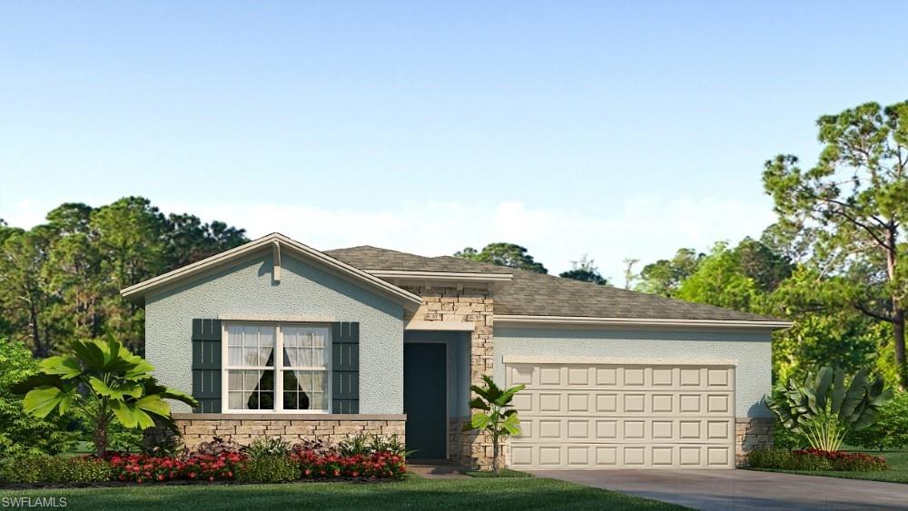 17737 Shade Tree Loop Punta Gorda, FL 33982 - Photo 1 of 28 View of front of house with stone siding, an attached garage, and driveway