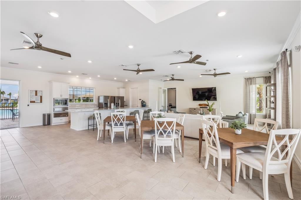 17737 Shade Tree Loop Punta Gorda, FL 33982 - Photo 9 of 28 Dining area with light tile patterned flooring