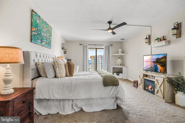 a bedroom with a bed and furniture
