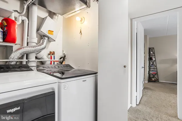 a kitchen with a stove and a sink