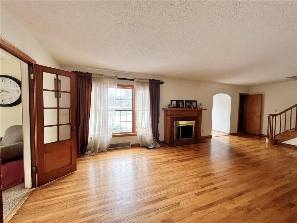 2045 Eastbrook Road New Castle, PA 16101 - Photo 3 of 23 a view of a livingroom with furniture and a fireplace
