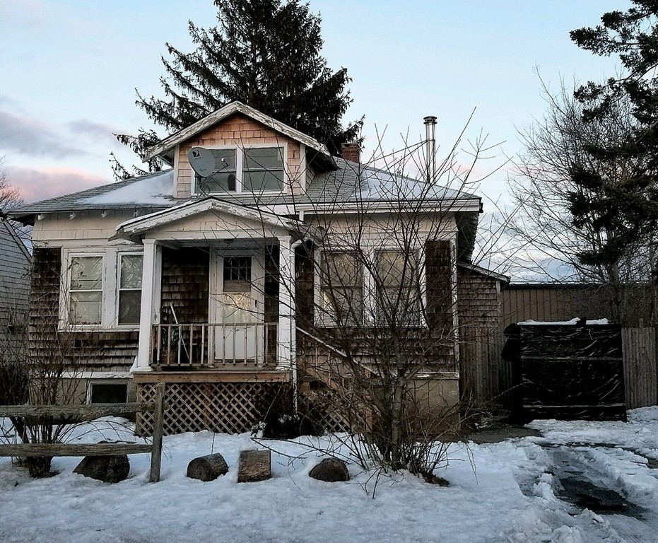 64 Ridgewood Avenue Barnstable, MA 02601 - Photo 1 of 1 a front view of a house with parking space