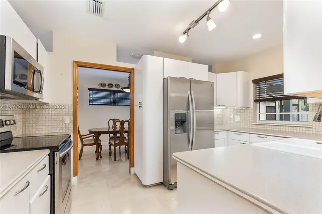 $1,025,000 | 13901 Southwest 78th Place, Palmetto Bay, FL 33158