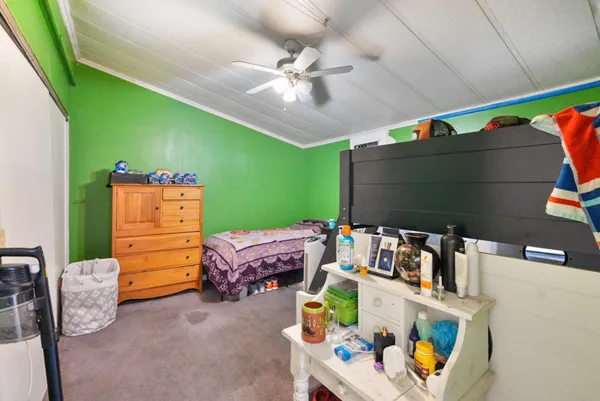 a room with furniture and a flat screen tv