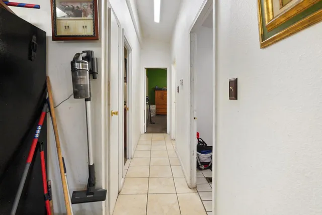 a view of walk in closet with clothes